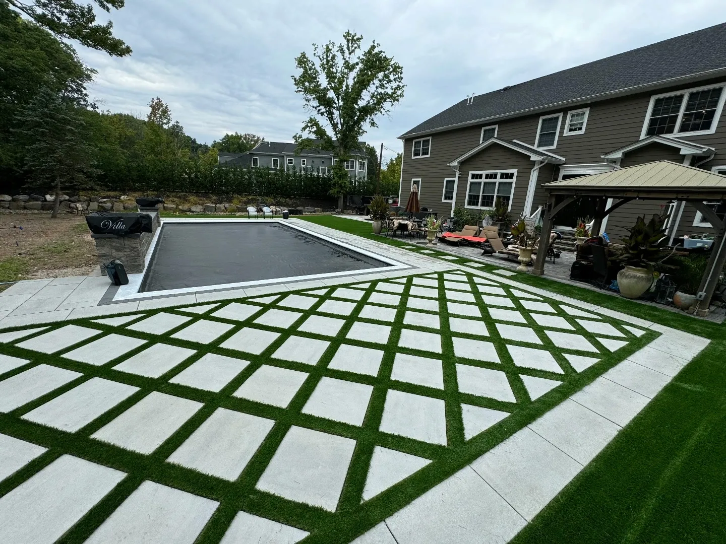 Paver and synthetic turf grid pool deck with gazebo in Old Bridge, NJ